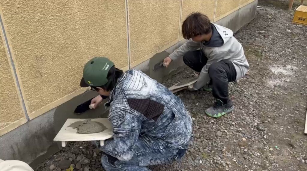 左官見習い